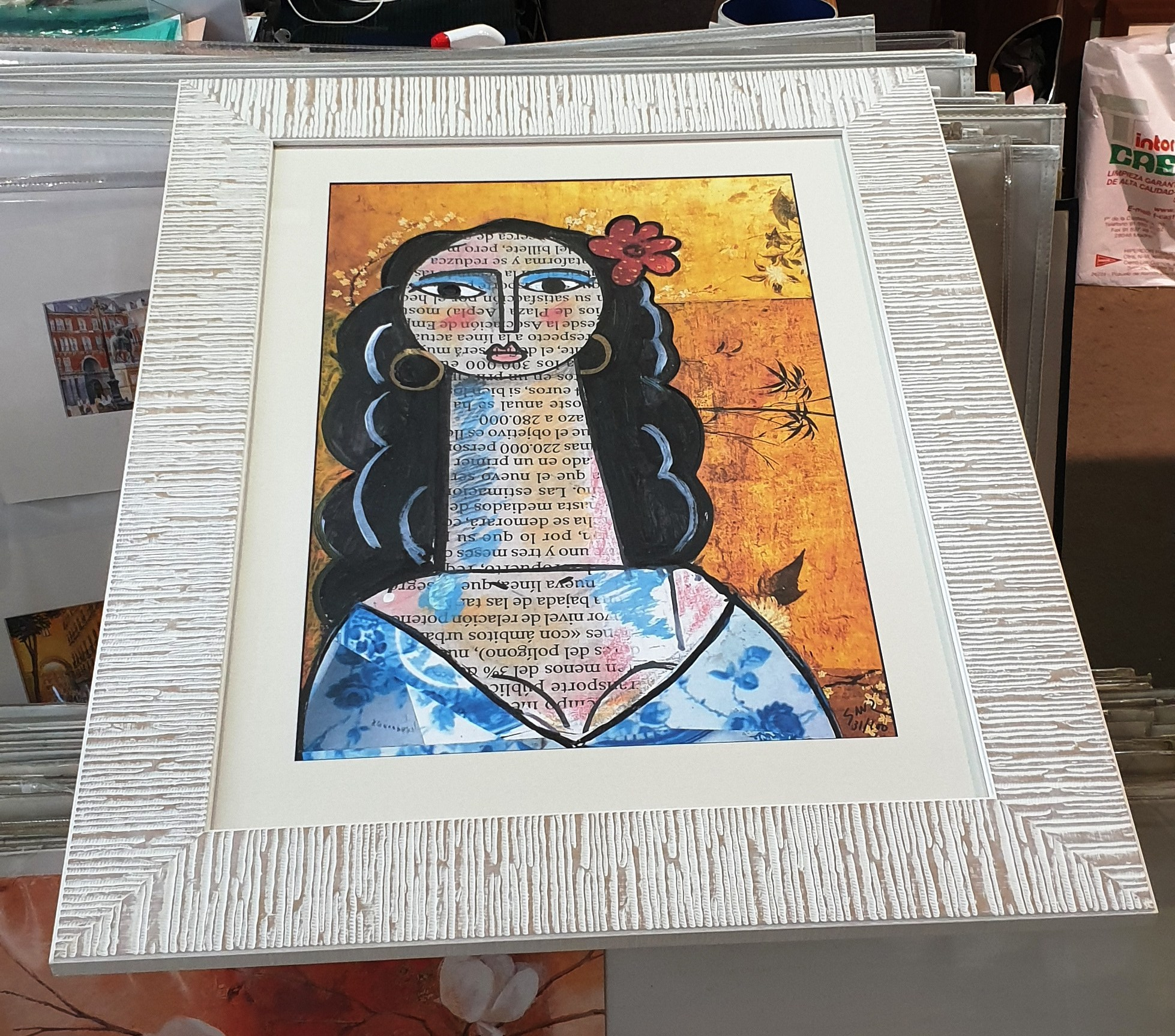 Obra original y enmarcada.